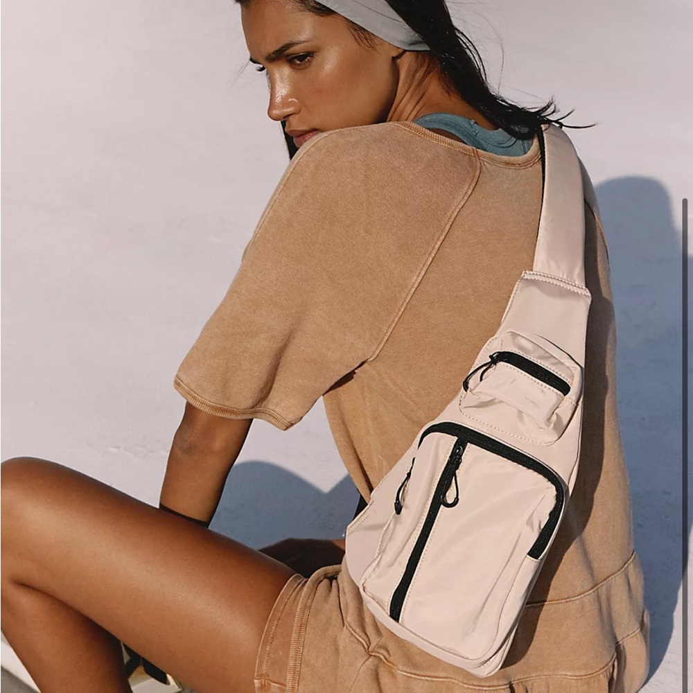 Free people movement sprint sling bag.